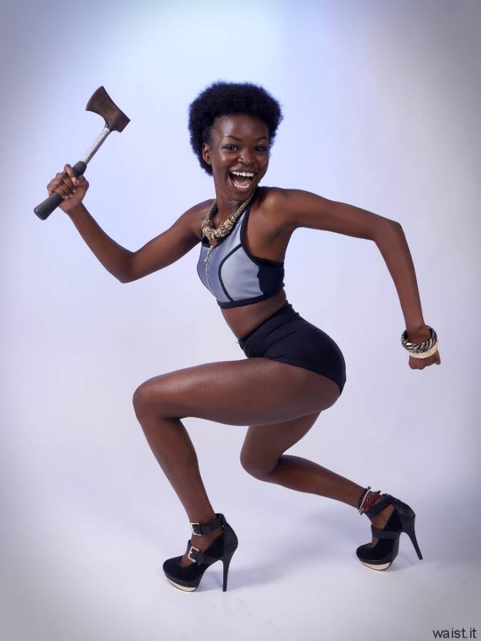 photographer waist it acting modelling photo. 20160115 lilli doing juggalo logo pose in silver sports top and tight black briefs            lilli is an anglougandan model who is very proud of her african heritage she was keen that our vintage pinup fitness sho