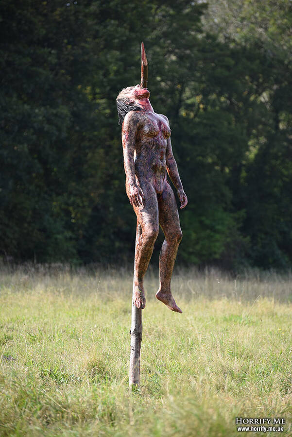 photographer HorrifyMeUK horror makeup modelling photo. a realistic depiction of an impaled girl inspired by the film cannibal holocaust this was a real girl and a live effect with no cgi or photoshop trickery.